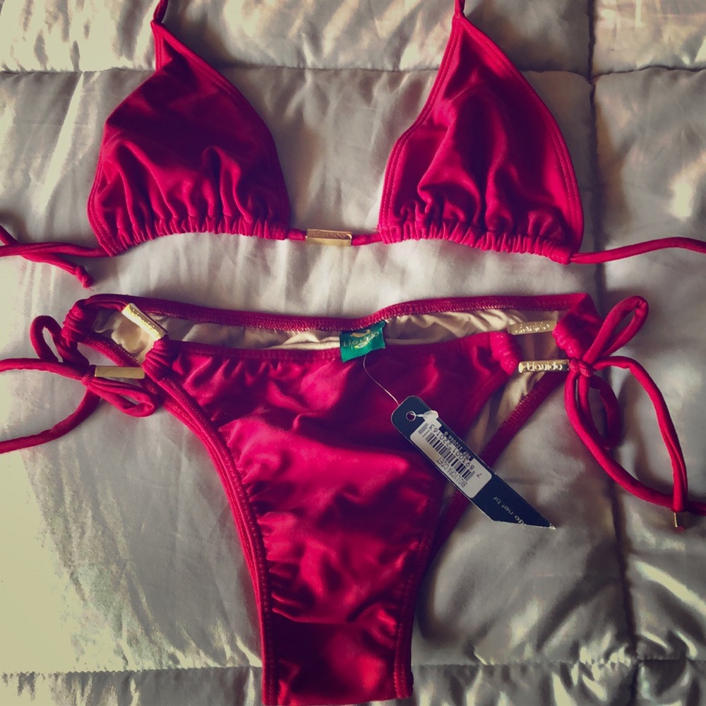 Brazilian bikini brand new with gold beach adorns.